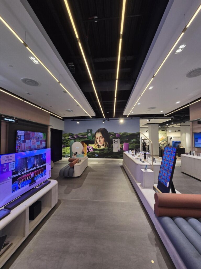 Lighting, flooring, and wall finishes inside the CASETiFY retail interior design